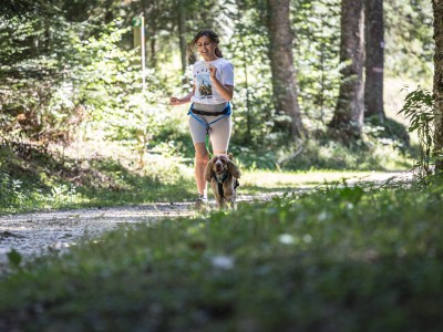 Why is running with your dog beneficial?